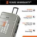 Silver hard-shell suitcase with upright handle and side corner detail