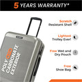 Silver hard-shell 8-wheel suitcase close-up with extended handle and side panel