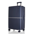 Hard-shell polycarbonate trolley suitcase, navy blue, side view with top handle and wheels
