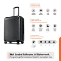 Charcoal grey medium suitcase with upright handle and ribbed shell