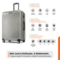 Large check-in suitcase infographic with silver ribbed shell and 4 wheels