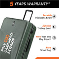 Hard-shell trolley suitcase in dark green with side view handle and 8-wheel wheels.