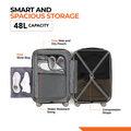 Small cabin suitcase interior view with divider, compression straps, and hanging toiletry pouch
