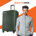 Large check-in suitcase in dark green with ridged shell and 8 wheels.