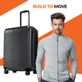 Black hard-shell 8-wheel suitcase with top handle and textured shell