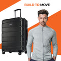 Black hard-shell suitcase with upright handle and rolling wheels