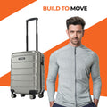 Small cabin suitcase in silver with telescopic handle and 8 spinner wheels