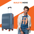 Blue hard-shell suitcase with orange edge strip and telescopic handle