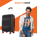 Hard-body small suitcase with telescopic handle and 8-wheel base, black with red accents.