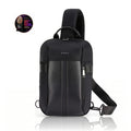 Black crossbody sling bag with front zipper, padded sides, and adjustable shoulder strap.