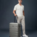 Small cabin suitcase, silver polycarbonate with 8 wheels and telescopic handle