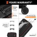 Black trolley suitcase details: side lock, top handle, and large spinner wheels