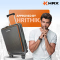 Black HRX commute trolley with laptop compartment and orange trim, 4 spinner wheels
