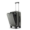 Dark grey polycarbonate cabin trolley with extended telescopic handle and spinner wheels