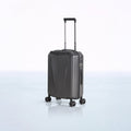 Dark grey hard-shell trolley luggage with textured front panel and spinner wheels