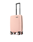 Pink cabin suitcase with ribbed hard shell, side view, black wheels and handle