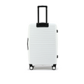 Large check-in suitcase rear view in white with ribbed hard shell and 8 spinner wheels.