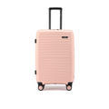 Peach medium hard-shell suitcase with telescopic handle and corner bumpers