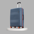 Blue large check-in suitcase with red side stripe, black top handle, and orange wheels