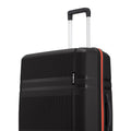 Black hard-shell luggage top with telescopic handle and red edge stripe.