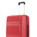 Red medium check-in suitcase top close-up with handle and black side trim
