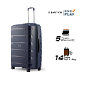 Blue large check-in trolley with telescopic handle and front spinner wheels, standing upright.