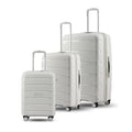 Set of three white polypropylene trolley cases with telescopic handles and spinner wheels