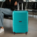 Teal large upright spinner trolley with telescopic handle and 4 wheels