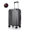 Hard-shell trolley suitcase, dark grey polycarbonate shell with telescopic handle and wheels