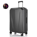 Dark grey hard-shell polycarbonate trolley suitcase, angled view, telescopic handle and wheels