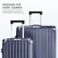 Blue polycarbonate suitcase with telescopic handle and ribbed hardshell