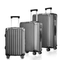 Blue three-piece polycarbonate spinner luggage set with wheels, handles, and ribbed design