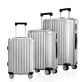 Set of 3 silver hardside suitcases with telescopic handles and four dual spinner wheels