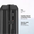 Hard-shell polycarbonate trolley luggage close-up of combination lock on side