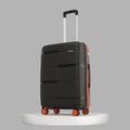 Black ribbed rolling suitcase with telescopic handle and orange-accented wheels
