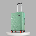 Green hard-shell check-in suitcase with telescopic handle and red wheel accents