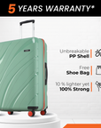 Green hard-shell suitcase with black handle and red wheels, side angle view