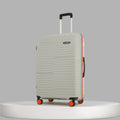 Closed large check-in suitcase in off-white with ridged texture, top handle and 4 wheels