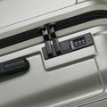 Hardside check-in suitcase with built-in combination lock and zip pull, metallic finish