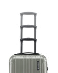 Small cabin suitcase with silver-green shell and extended telescopic handle in three tiers.