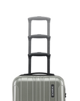 Small cabin suitcase with telescopic handle, silver hard shell and ridged panels, 8-wheel design