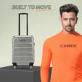 Silver check-in suitcase with telescopic handle and ridged shell on wheels
