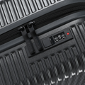 Charcoal grey suitcase zipper pull and lock panel on ridged hardshell