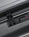 Small cabin suitcase exterior with number lock and black grab handle panel.
