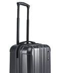 Small cabin suitcase with black shell, molded ridges, and extended trolley handle.