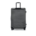 Large check-in suitcase in charcoal grey with ribbed finish, top handle, and 8 wheels