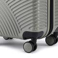 Silver small cabin suitcase with textured shell and corner wheels