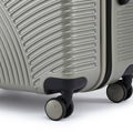 Silver suitcase corner with grip handle and 8 smooth rolling wheels