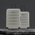 Hard body luggage set in silver with two upright wheeled suitcases and telescopic handles