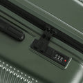 Dark green suitcase zipper and built-in lock with keypad detail
